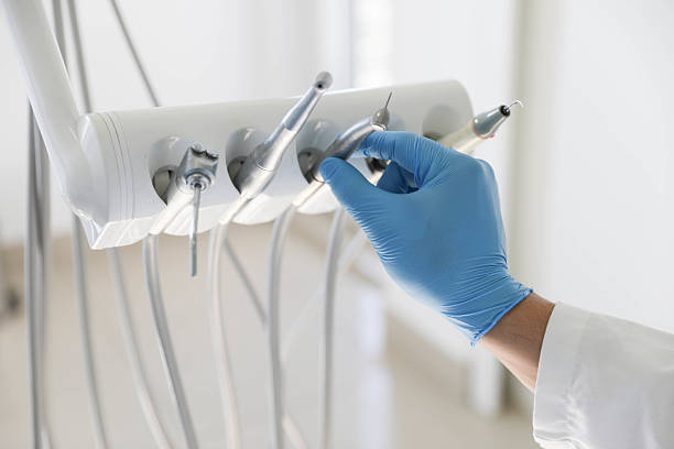 Professional Emergency Dentist technician working in Harrison, NJ